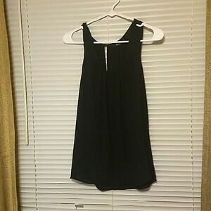 Linen black tank top. Size M. Really nice.I  just don't wear black well. New